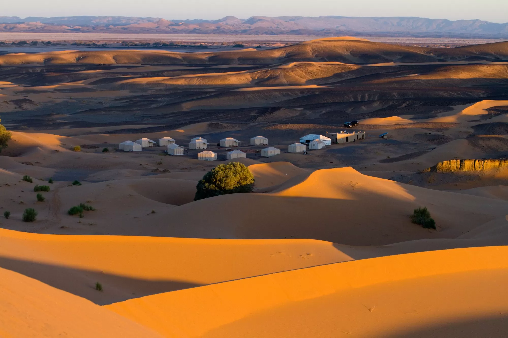 How Cold Does It Get in the Desert at Night? Morocco Guide 2 Cold morning sunrise over Erg Chebbi dunes in Merzouga